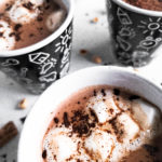 Close up picture of 3 mugs full of hot chocolate